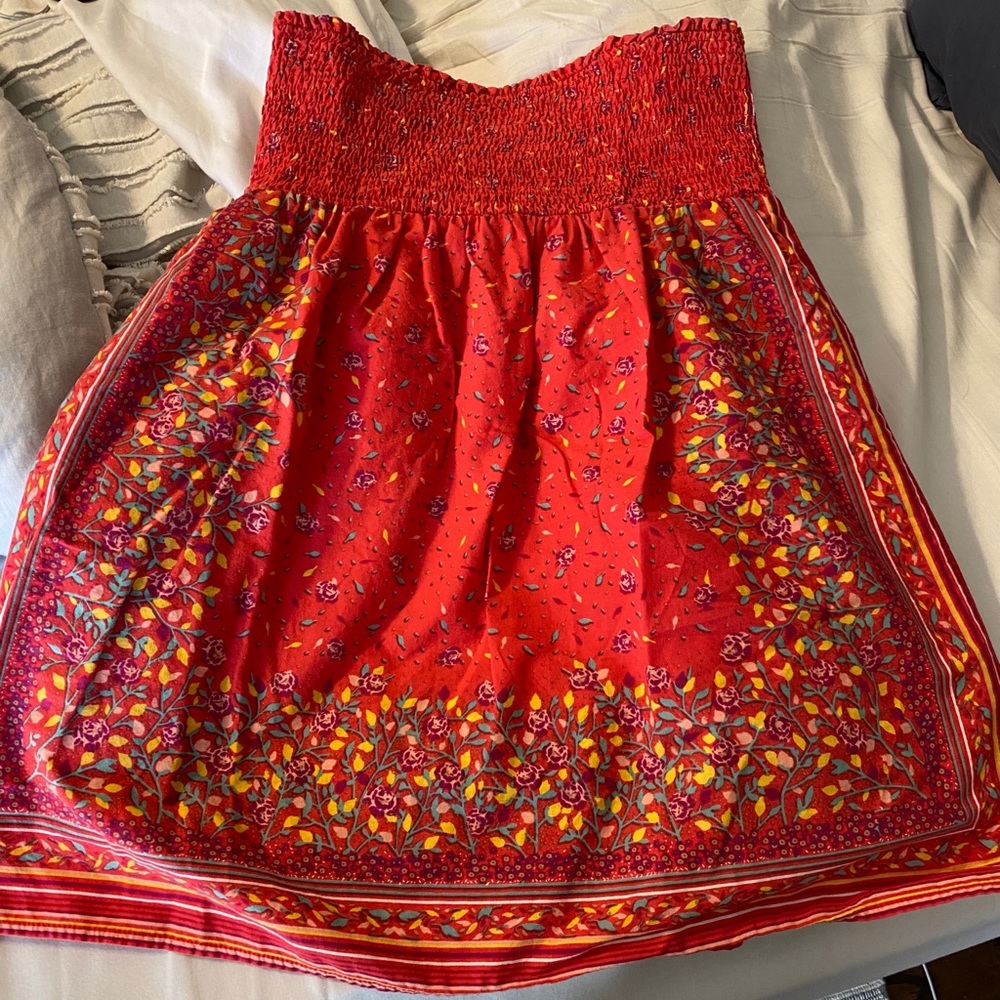 Short, colorful dress/swim coverup.